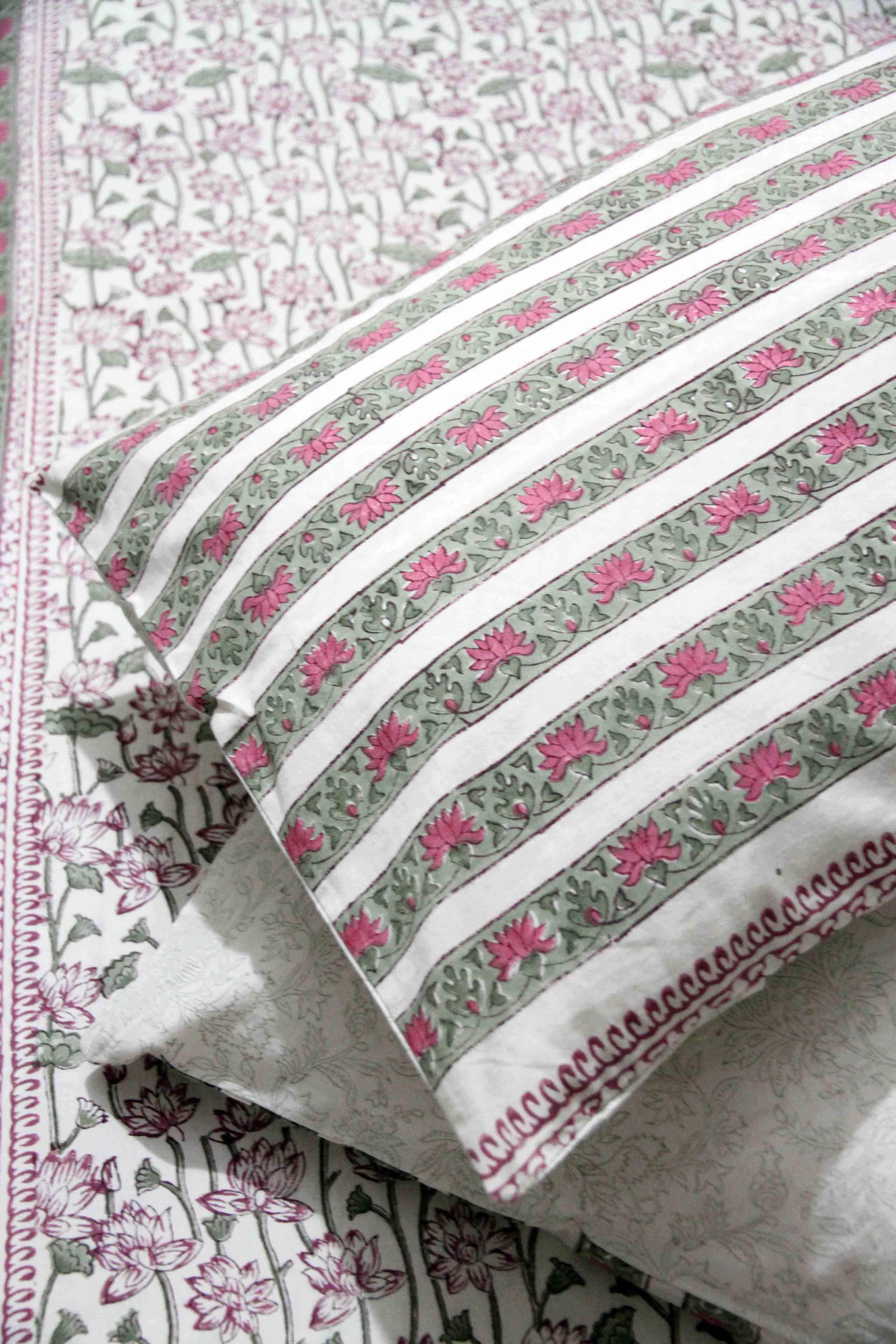 Pink and green lotus block printed cotton bedsheet with pillow covers