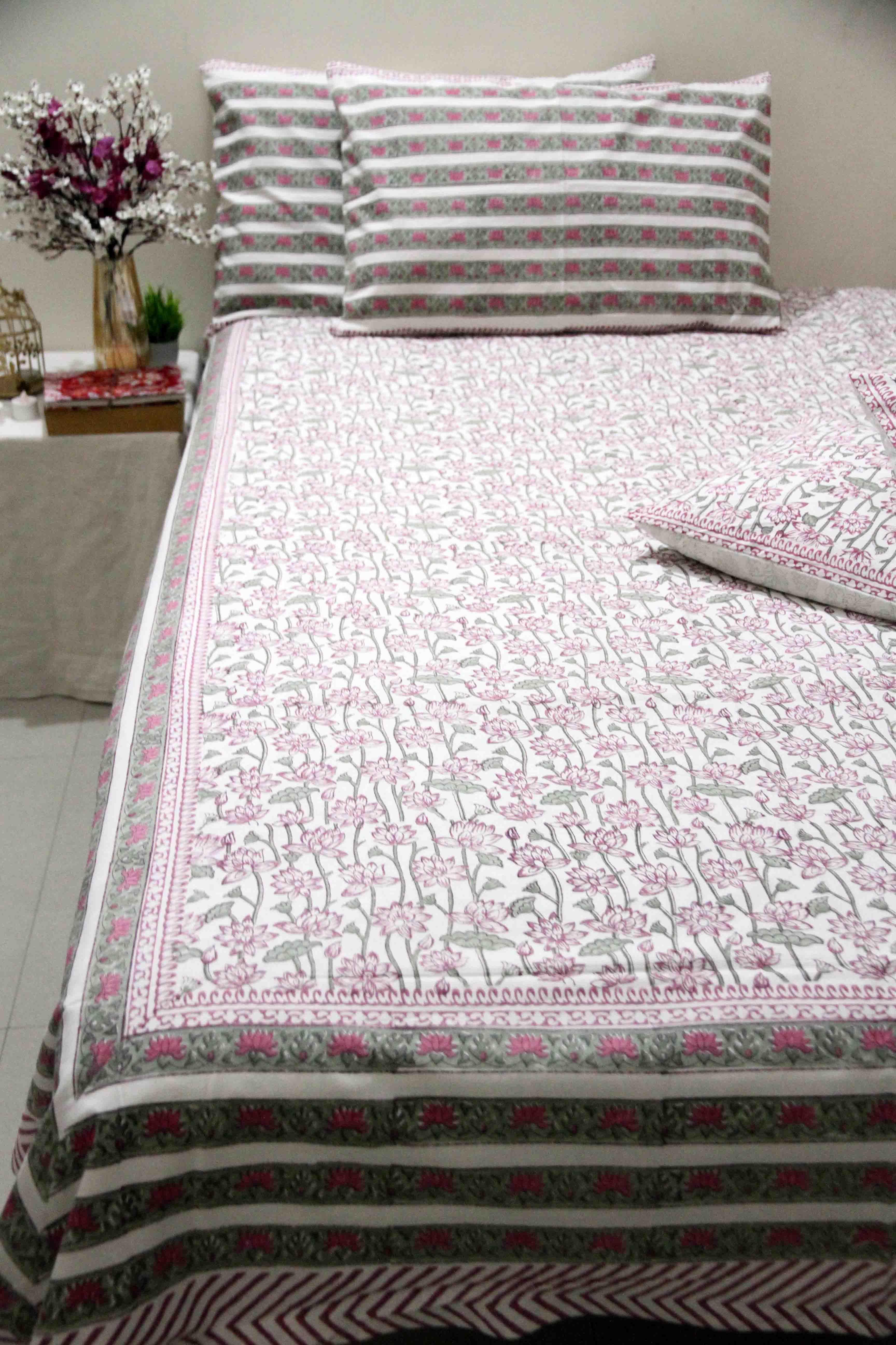 Pink and green lotus block printed cotton bedsheet with pillow covers