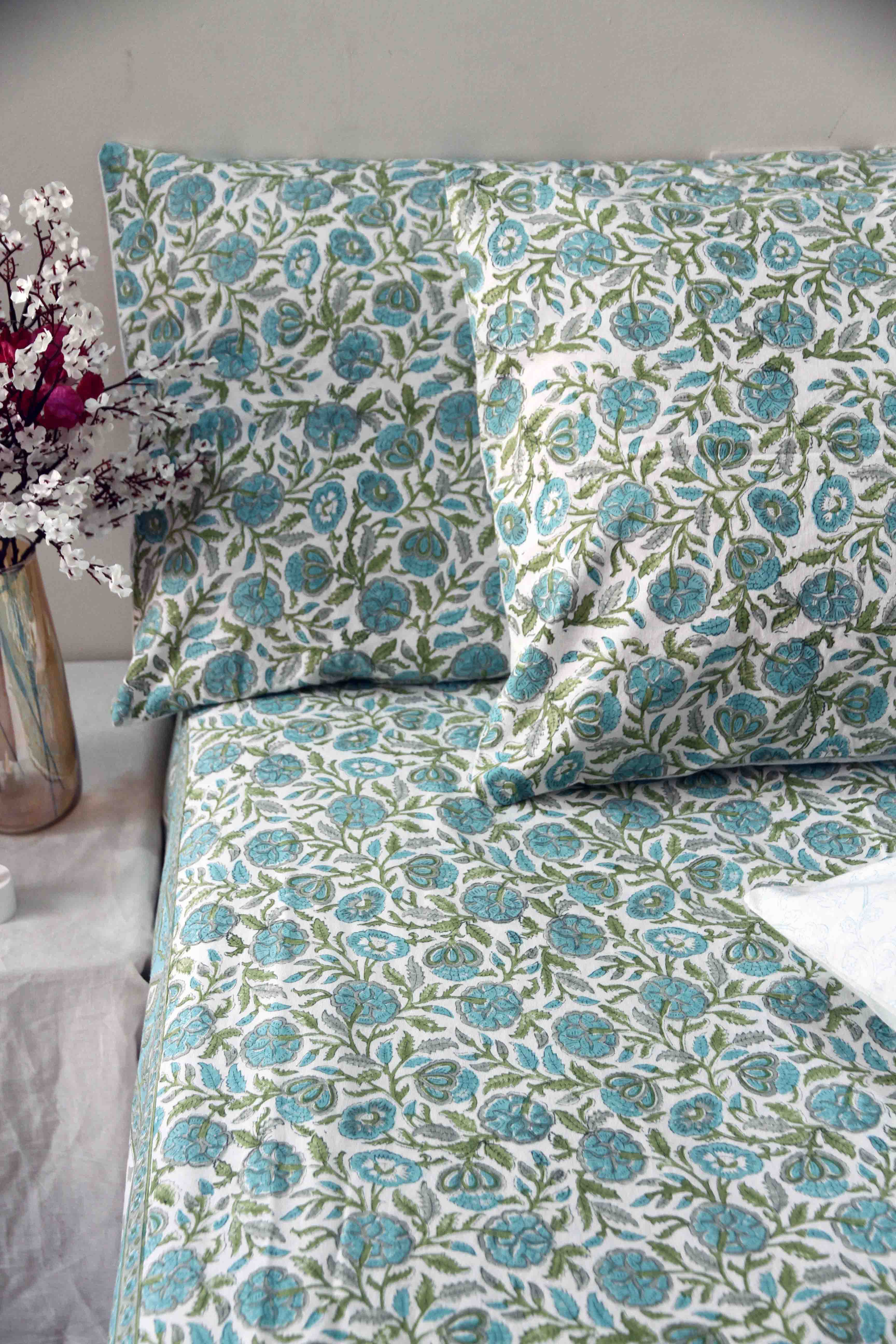 Teal and white block printed floral cotton bedsheet with pillow covers