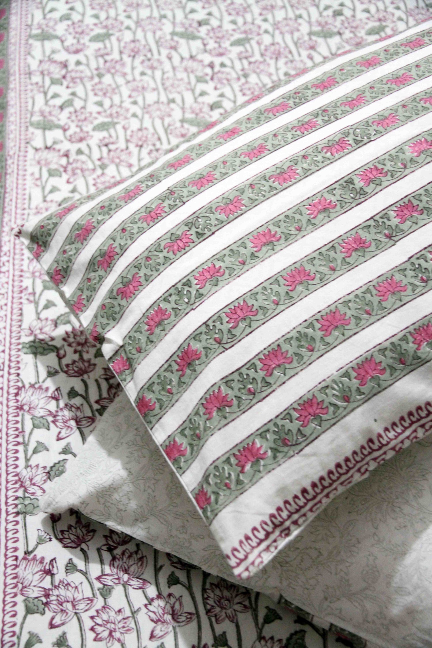 Pink and green lotus block printed cotton bedsheet with pillow covers