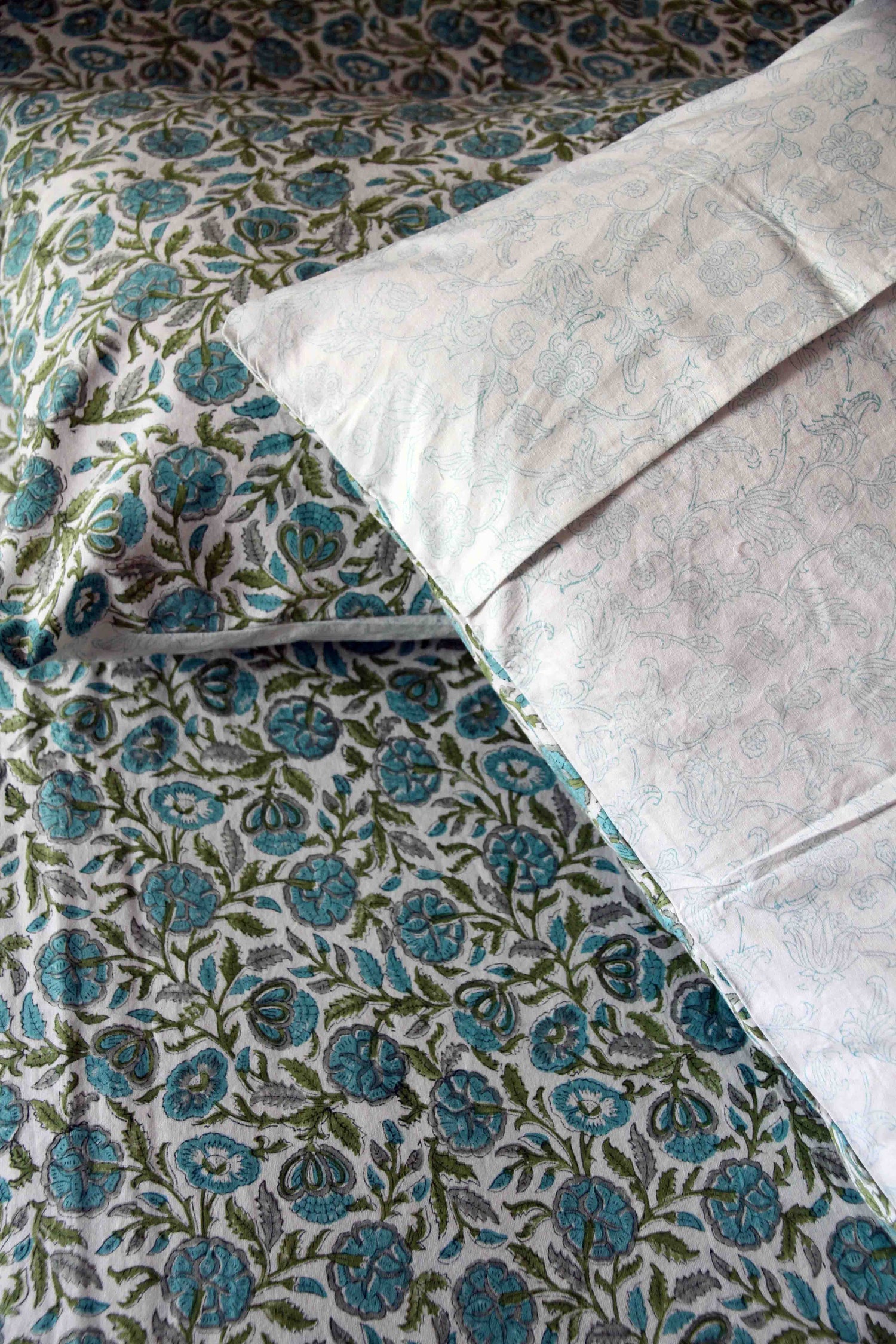 Teal and white block printed floral cotton bedsheet with pillow covers