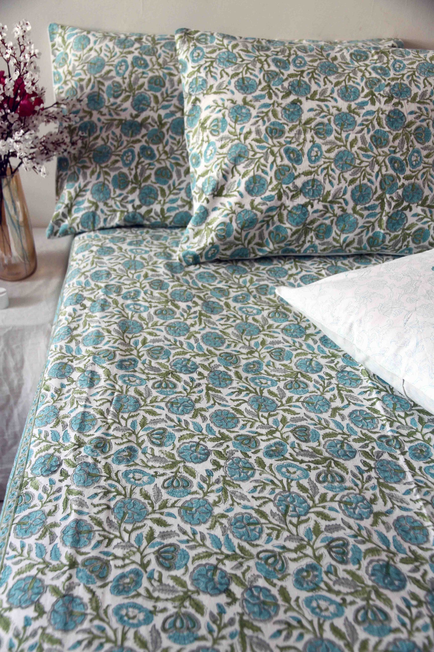 Teal and white block printed floral cotton bedsheet with pillow covers