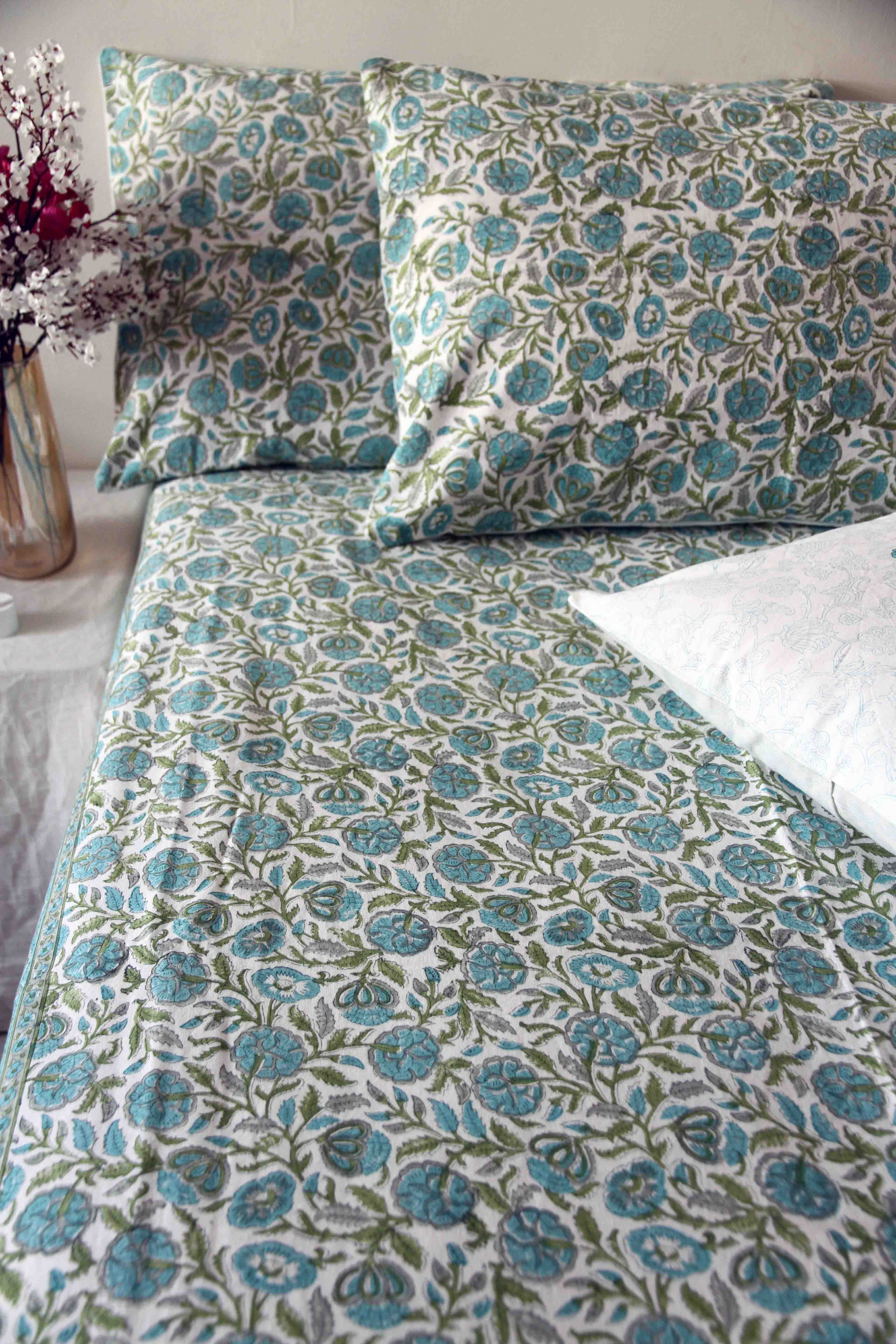 Teal and white block printed floral cotton bedsheet with pillow covers