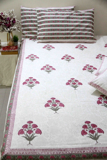 White and pink block printed cotton bedsheet with pillow covers