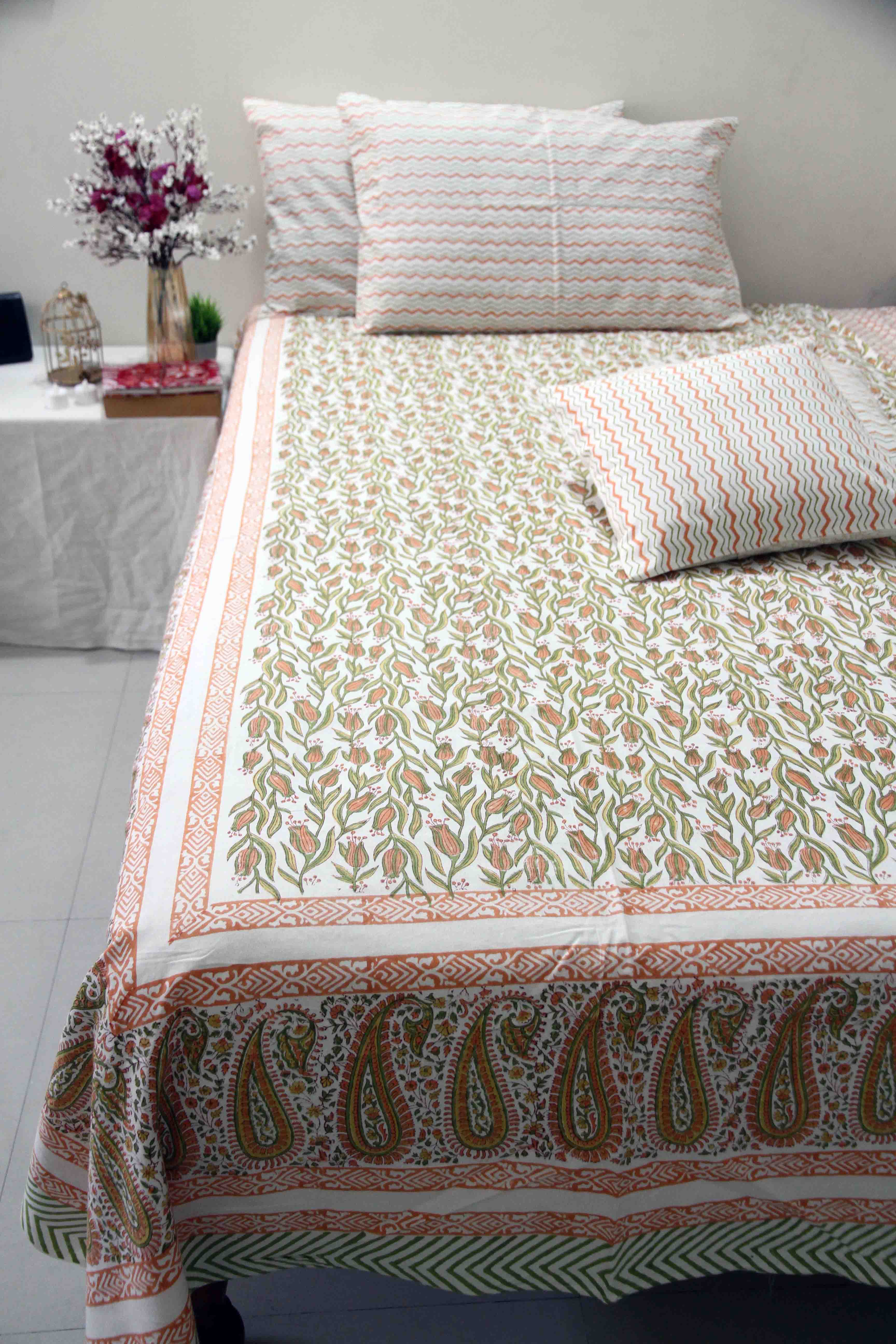 orange and green floral block printed cotton bedsheet with pillow covers