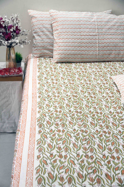 orange and green floral block printed cotton bedsheet with pillow covers