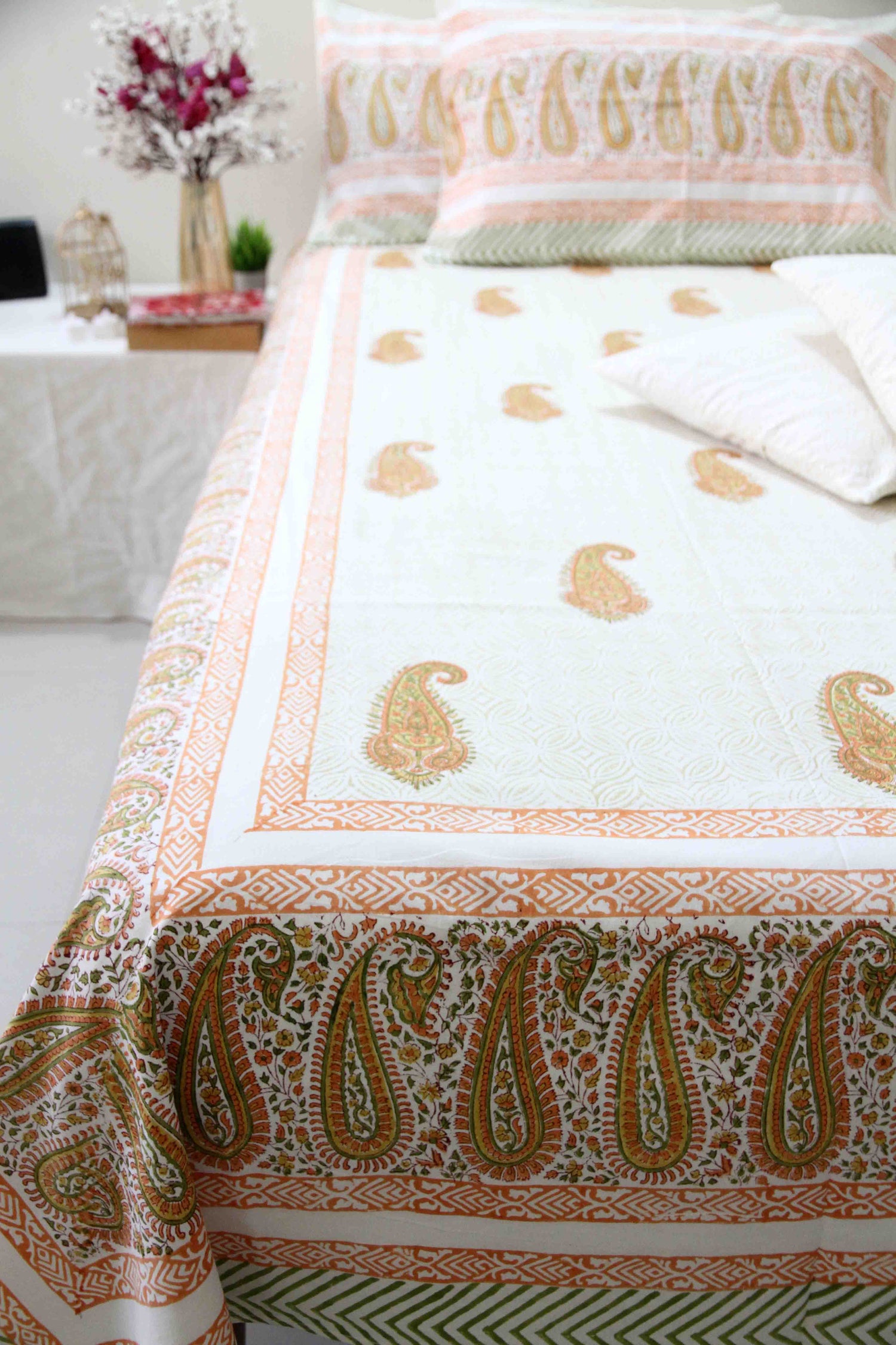 orange and white booti block printed cotton bedsheet with pillow covers