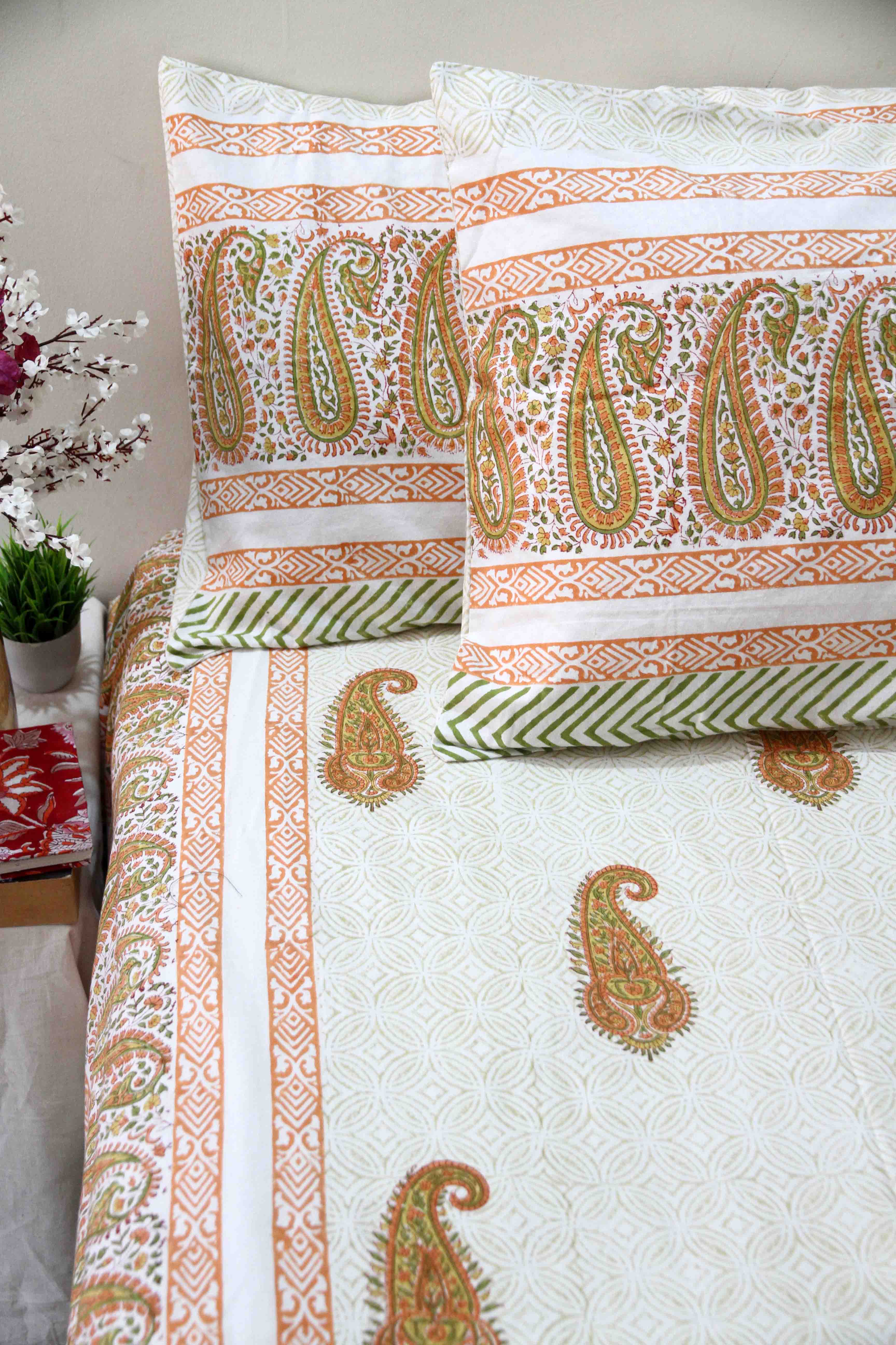 orange and white booti block printed cotton bedsheet with pillow covers