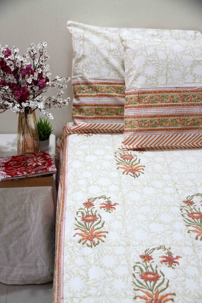 orange and white floral block printed cotton bedsheet with pillow covers