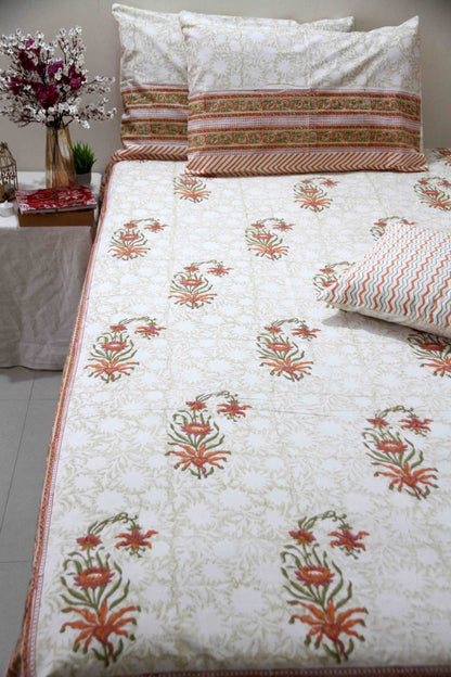 orange and white floral block printed cotton bedsheet with pillow covers